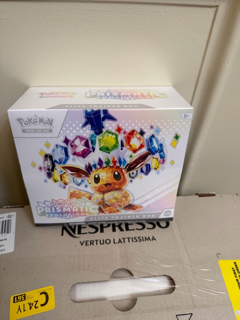 Pokemon Prismatic Evolutions Elite Trainer Box - White with Multicolor Gems